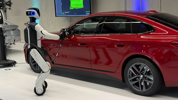 BMW Leipzig’te İnsansı Robotları Test Ediyor, © Christof Rührmair/dpa