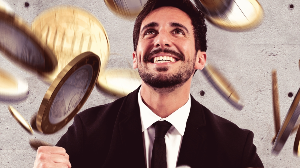 Mann im Geldregen, © Shutterstock