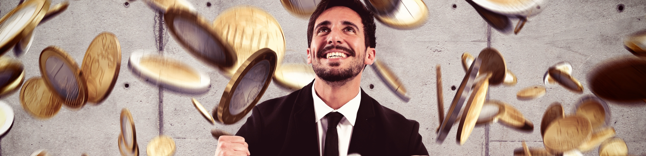 Mann im Geldregen, © Shutterstock