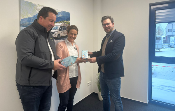 Björn Wolf mit N.und S. Albrecht, © MORE Marketing