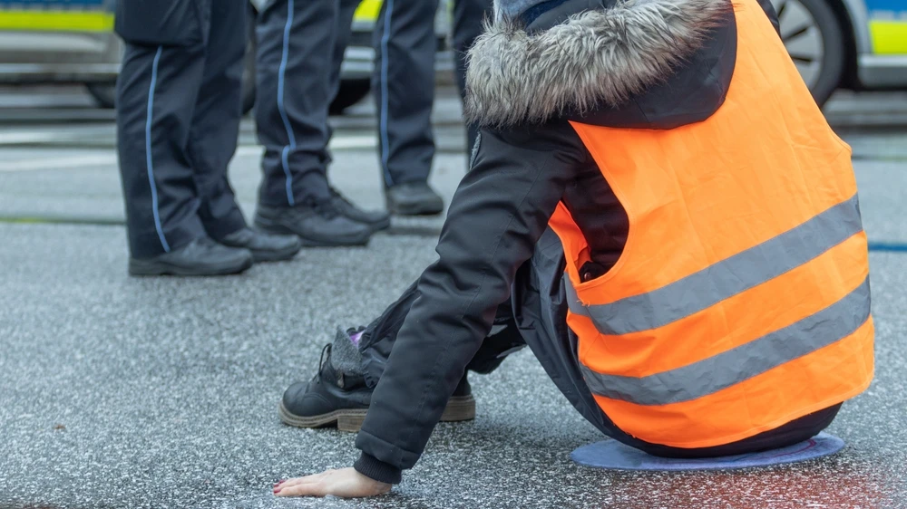 Klimakleber, © Shutterstock Klimakleber, © Shutterstock