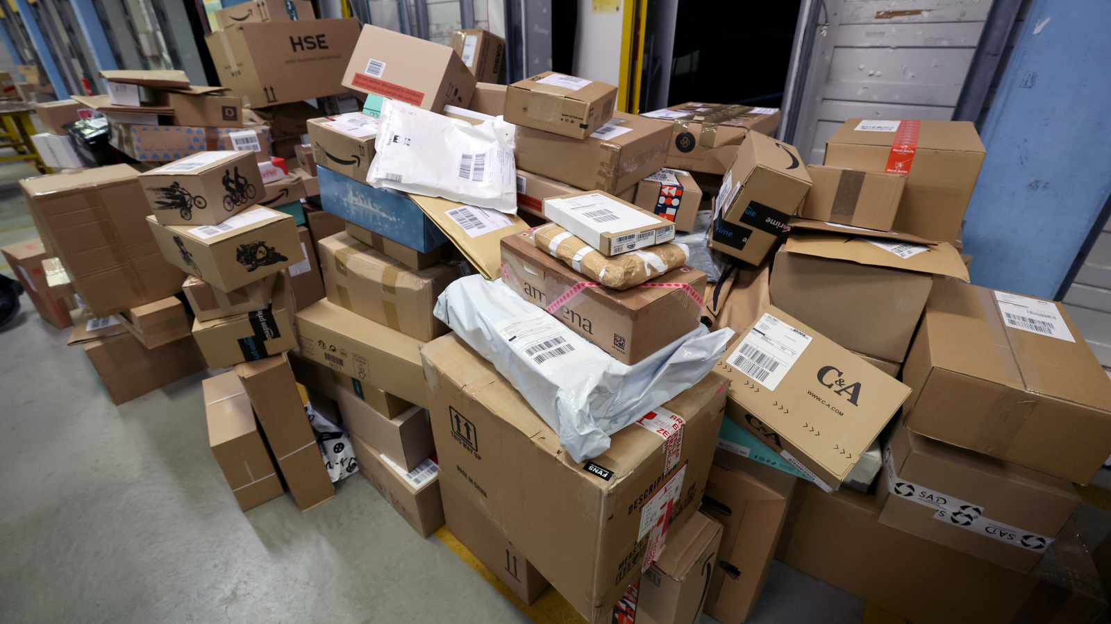 İndirim Haftası DHL’ye Rekor Getirdi: Bir Günde 12,4 Milyon Paket, © Bernd Wüstneck/dpa