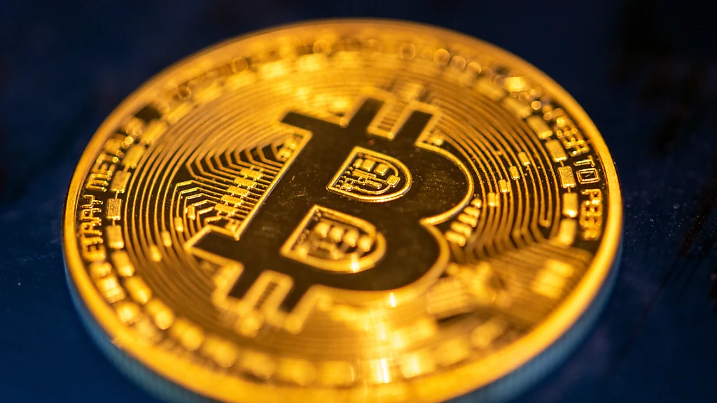 Bitcoin kratz an Marke von 70'000 Dollar, © Keystone/SDA Bitcoin kratz an Marke von 70'000 Dollar, © Keystone/SDA