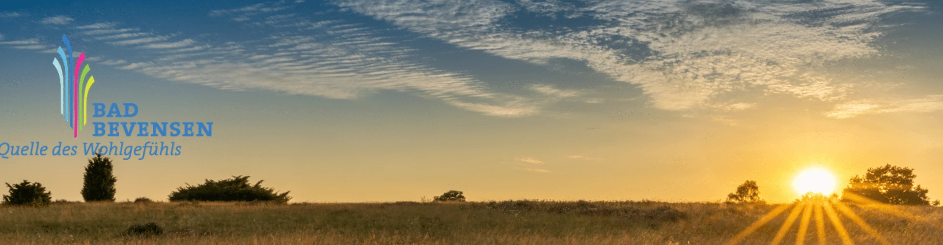 Header vom Bad Bevensen. Sonnenuntergang zu sehen und das Logo, © Bad Bevensen Header vom Bad Bevensen. Sonnenuntergang zu sehen und das Logo, © Bad Bevensen